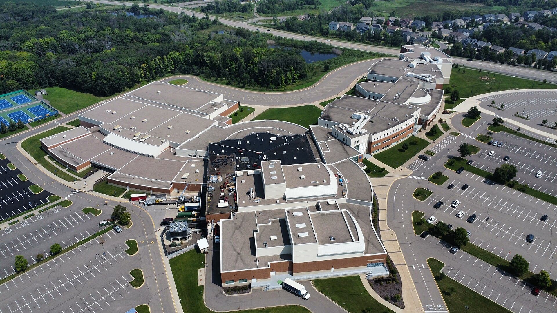 Aerial view of Wayzata High School's campus and athletic fields in Plymouth, Minnesota.